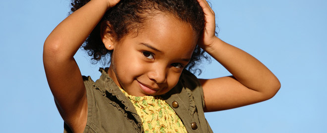 child in brown shirt